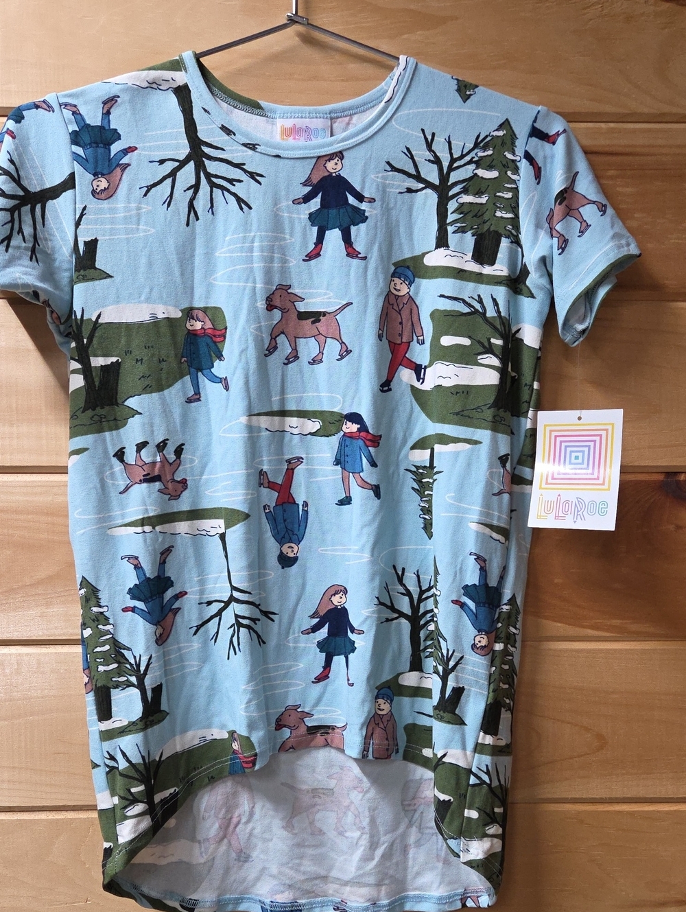 LuLaRoe Kids Gracie Light Blue Winter Scene Tee with Green Accents